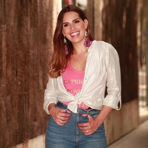 Capricorn sign pink swimsuit and bodysuit.